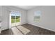 Living space featuring sliding glass doors opening to backyard with beautiful green views at 147 Young Farm Dr, Lillington, NC 27546