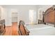 Spacious bedroom with hardwood floors and a walk-in closet at 1532 Rockwood Downs Dr, Wendell, NC 27591