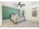 Bright bedroom with a bed, and multiple windows at 1532 Rockwood Downs Dr, Wendell, NC 27591