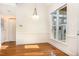 Bright dining area with a modern chandelier and large window at 1532 Rockwood Downs Dr, Wendell, NC 27591