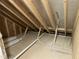 Spacious unfinished attic showing subflooring and roof supports at 162 Kirkwall Ln, Selma, NC 27576