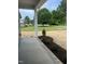 Exterior view of a home and front yard showing new mulch and landscaping at 162 Kirkwall Ln, Selma, NC 27576