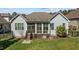Beautiful backyard featuring a screened-in porch and well-maintained landscaping at 1637 Hasentree Villa Ln, Wake Forest, NC 27587
