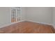 This office features hardwood floors and large french doors at 1637 Hasentree Villa Ln, Wake Forest, NC 27587