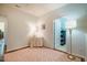 Upstairs loft area with patterned carpet and access to other rooms, offering a versatile living space at 211 Monarda Way, Hillsborough, NC 27278
