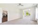 Open living area with hardwood floors and view of kitchen at 217 Walker Grv Ln, Lillington, NC 27546