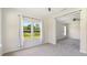 Bright living area with carpet and natural light at 217 Walker Grv Ln, Lillington, NC 27546