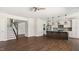 Open-concept living area with stairs adjacent to kitchen island at 217 Walker Grv Ln, Lillington, NC 27546