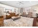 Spacious living room boasts an open layout, hardwood floors, and stylish furniture at 2309 Laurelford Ln, Wake Forest, NC 27587