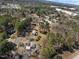A neighborhood aerial view surrounded by lots of trees and nature at 2311 Glover Rd, Durham, NC 27703