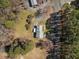 An aerial view of the home with mature trees at 2311 Glover Rd, Durham, NC 27703