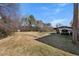 A large backyard with a carport and ample green space at 2311 Glover Rd, Durham, NC 27703