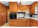 Traditional kitchen with wood cabinets and integrated oven, plus laminate countertops at 2311 Glover Rd, Durham, NC 27703