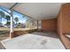 Back patio area that has lots of space with an exit door to go outside at 2311 Glover Rd, Durham, NC 27703