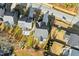 Aerial view showing the roof tops, lawns, and mature landscaping at 2505 Mt Zion Church Rd Rd, Apex, NC 27502