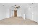 A bright room with a ceiling fan and a wooden sliding door at 2505 Mt Zion Church Rd Rd, Apex, NC 27502