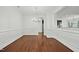 Bright dining room featuring hardwood floors, modern lighting, and ample space at 2505 Mt Zion Church Rd Rd, Apex, NC 27502