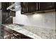 Contemporary kitchen features sleek granite countertops, subway tile backsplash, and stainless steel appliances at 2505 Mt Zion Church Rd Rd, Apex, NC 27502