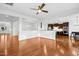 Spacious living room with an open layout, hardwood floors, and modern lighting at 2505 Mt Zion Church Rd Rd, Apex, NC 27502
