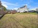 Large backyard with a fenced perimeter and ample space for outdoor activities at 2639 Bowden Dr, Creedmoor, NC 27522