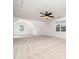 Bright bonus room features neutral carpet, large windows, and a ceiling fan at 2639 Bowden Dr, Creedmoor, NC 27522