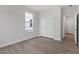 Well-lit bedroom with a double closet and hardwood floors at 3016 Dog Rose Dr # 303, Durham, NC 27703