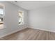 Cozy bedroom with a large window providing ample natural light and scenic views at 3016 Dog Rose Dr # 303, Durham, NC 27703