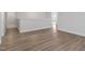 Upstairs hallway featuring wood look floors, a neutral color palette, and natural light at 3016 Dog Rose Dr # 303, Durham, NC 27703