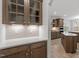 Elegant kitchen featuring sleek countertops, ample cabinet space, and modern appliances at 3016 Dog Rose Dr # 303, Durham, NC 27703