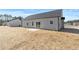 Well-maintained backyard with a sliding glass door at 3131 Pilson Rd, Cameron, NC 28326
