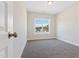 Cozy bedroom with a large window providing natural light, offering a comfortable retreat at 3131 Pilson Rd, Cameron, NC 28326