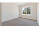 A bright and airy bedroom with a window offering a peaceful view and natural light at 3131 Pilson Rd, Cameron, NC 28326