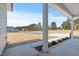Covered porch overlooking a spacious lot at 3131 Pilson Rd, Cameron, NC 28326