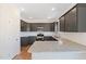 Stylish kitchen features stainless steel appliances, granite countertops, and dark cabinets at 3131 Pilson Rd, Cameron, NC 28326