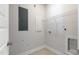 A functional laundry room offering essential utility connections and storage solutions for convenience at 3131 Pilson Rd, Cameron, NC 28326