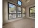 Bright bedroom featuring several large windows with lots of natural light at 32 Melstone Turn, Durham, NC 27707