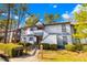 Attractive condo with two-story layout, well-kept grounds, and red exterior doors at 32 Melstone Turn, Durham, NC 27707