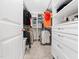 Organized walk-in closet featuring shelving and drawers perfect for storage and keeping clothes in order at 325 Azalea Gaze Dr, Youngsville, NC 27596