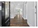Inviting foyer with hardwood floors, white trim, and plenty of natural light at 3306 Leaflet Church Rd, Broadway, NC 27505
