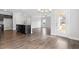 Open-concept living area boasts hardwood floors, neutral walls, and an inviting atmosphere with ample natural light at 3306 Leaflet Church Rd, Broadway, NC 27505