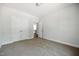This bedroom boasts neutral carpeting, light walls, and a closet offering ample storage space at 3328 Leaflet Church Rd, Broadway, NC 27505