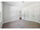 Bedroom features a view of the back yard and a large closet at 3328 Leaflet Church Rd, Broadway, NC 27505