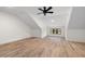Spacious bedroom with hardwood floors, natural light, and a ceiling fan at 3601 Bivins Rd, Hillsborough, NC 27278