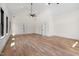 Spacious bedroom featuring vaulted ceilings, hardwood floors, and multiple windows, creating an open and airy feel at 3601 Bivins Rd, Hillsborough, NC 27278