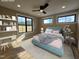 Bright bedroom features a large window, light blue furniture, and stylish decorations at 3601 Bivins Rd, Hillsborough, NC 27278