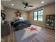 This spacious bedroom features stylish decor, a statement rug, and a large window at 3601 Bivins Rd, Hillsborough, NC 27278