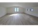 Bright bonus room with hardwood floors and multiple windows at 3601 Bivins Rd, Hillsborough, NC 27278