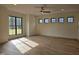 Bright bonus room features hardwood floors, recessed lighting, and multiple windows at 3601 Bivins Rd, Hillsborough, NC 27278