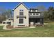 Charming two-story home with neutral siding, dark trim, and a welcoming front porch at 3601 Bivins Rd, Hillsborough, NC 27278