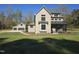 Charming two-story home with a landscaped yard and detached garage at 3601 Bivins Rd, Hillsborough, NC 27278
